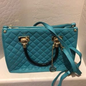 MT turquoise leather purse.